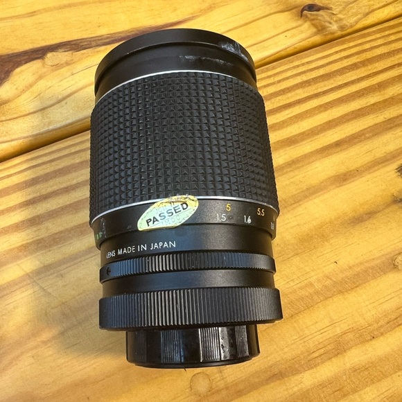 Yashica Black and Silver Film Camera with Rangefinder Design - Picture 7 of 12